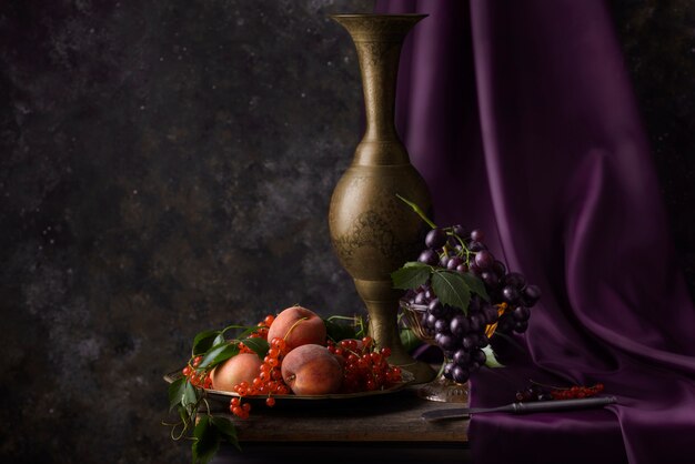 Baroque style with fruits and vase arrangement