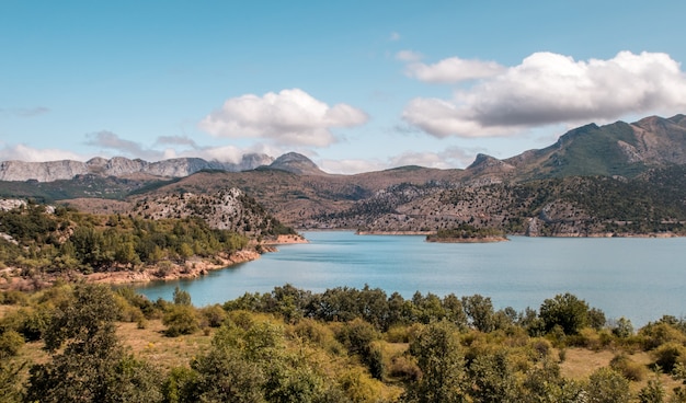 the Barrios de Luna lake in Spain surrounded by mountains