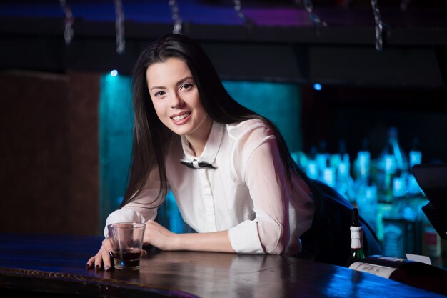 Bartender offering drink