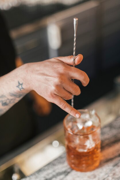 Bartender preparing a refreshing cocktail