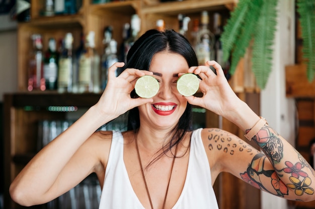 Free photo bartender with lemons