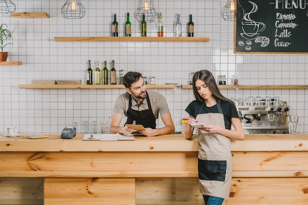 Bartenders near counter