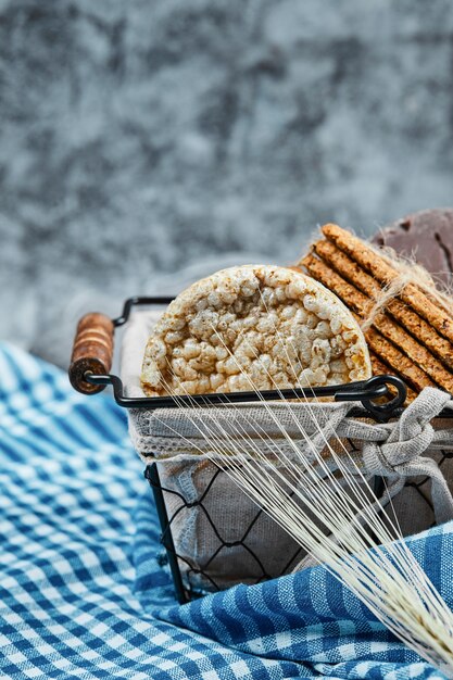 Basket of biscuits with a tablecloth.