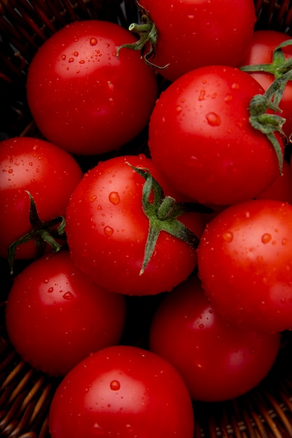 Free photo basket full of tomatoes