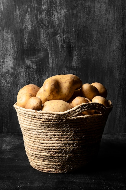 Free photo basket of potatoes with copy space