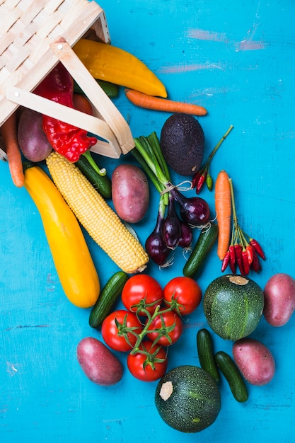 Basket with falling vegetables