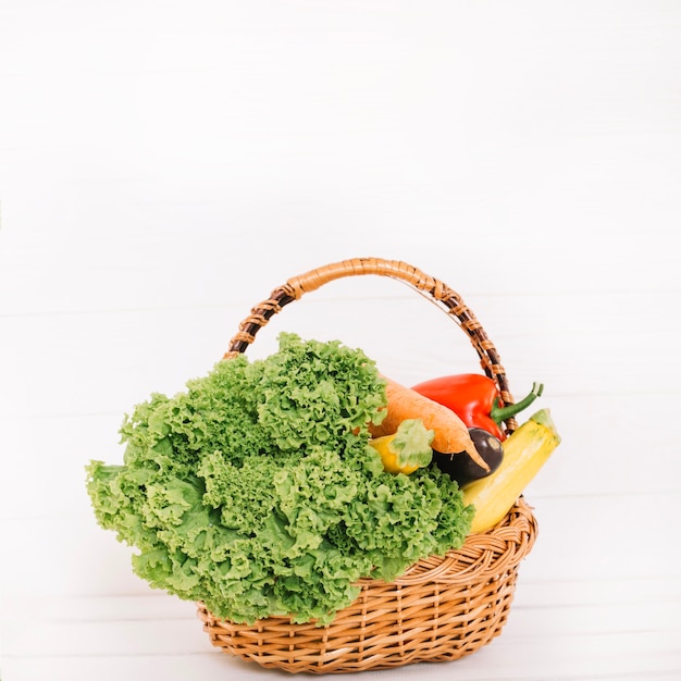 Basket with harvested vegetables