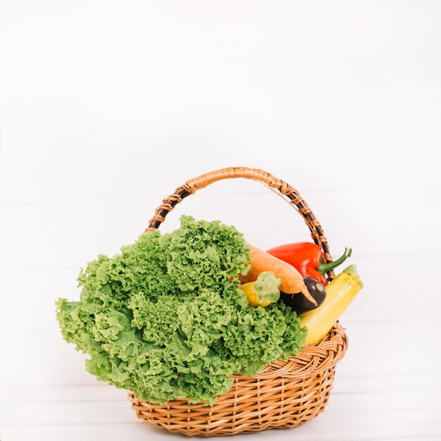 Basket with harvested vegetables