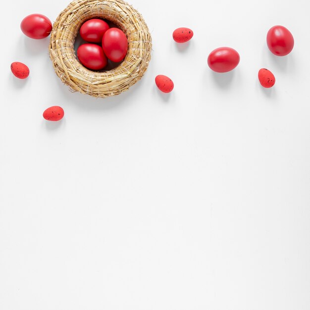 Basket with red eggs with copy space