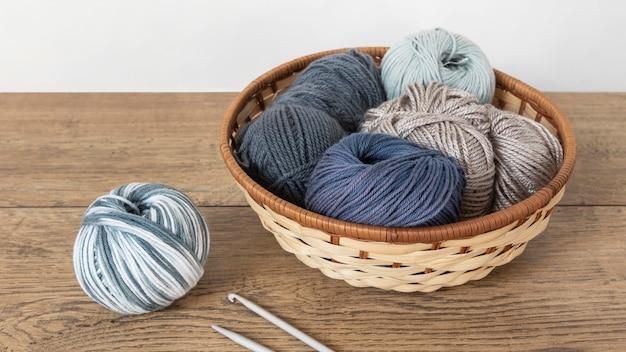 Basket with wool and knitting needles