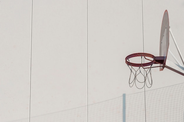 Basketball hoop against wall