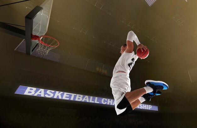 Basketball players on big professional arena during the game