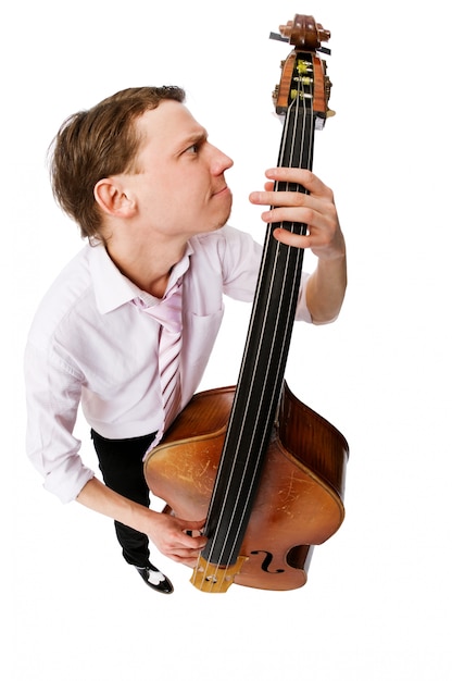 Free photo bass viol player on white background