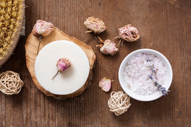 Bath items arrangement on wooden background