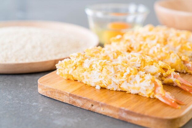 batter-fried prawns on wood board