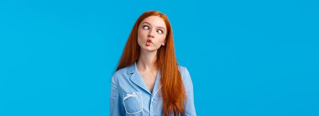 Be unusual carefree and funny cute redhead teenage girl fooling around showing roommate funny faces