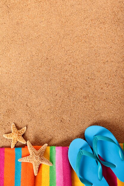 Beach background with flip flops