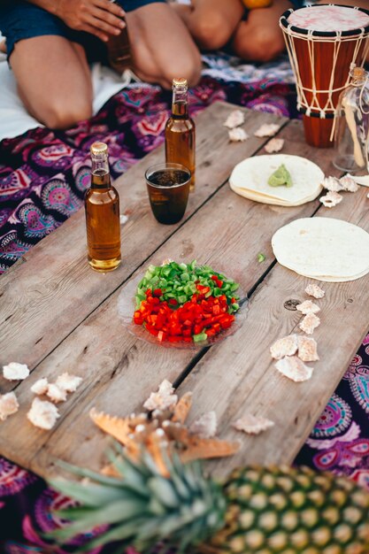 Beach party elements on wooden plank