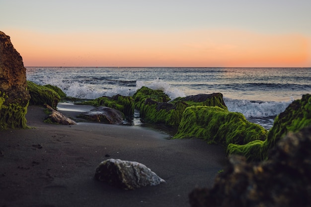 Beach scene at sunset