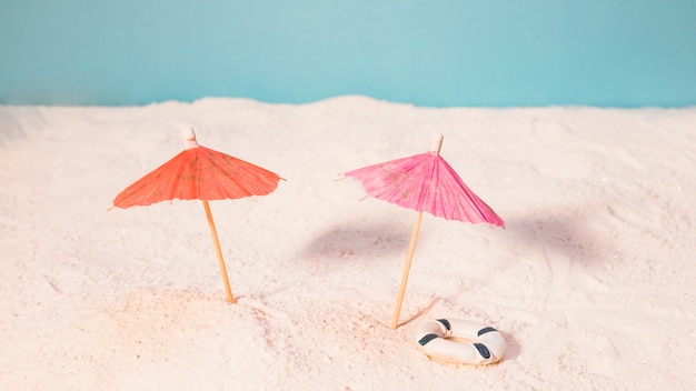 Beach with red sun umbrellas