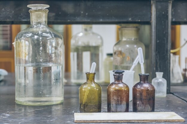 Beakers and equipment on table in factory laboratory