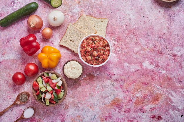 Bean soup in tomato sauce with vegetable salad.