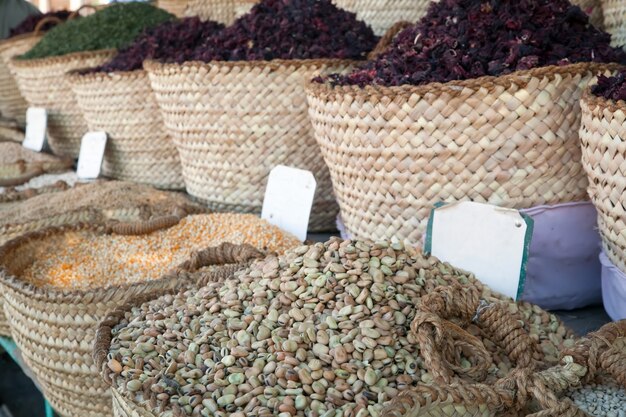 beans and other food in baskets on sale