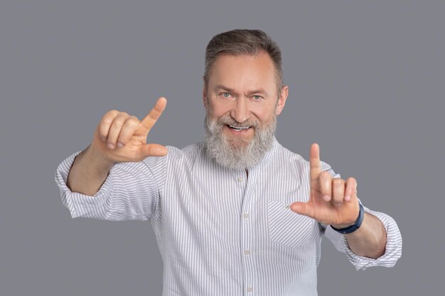 Bearded businessman looking confident and determined