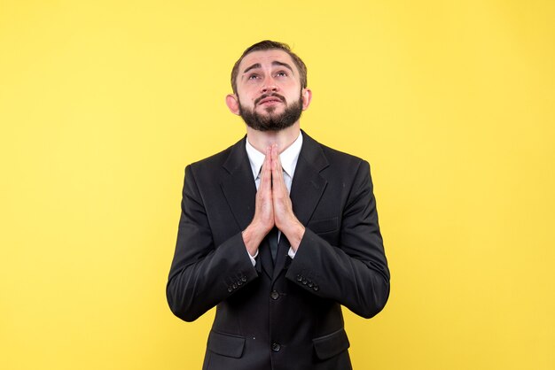 Free photo bearded man praying with hope