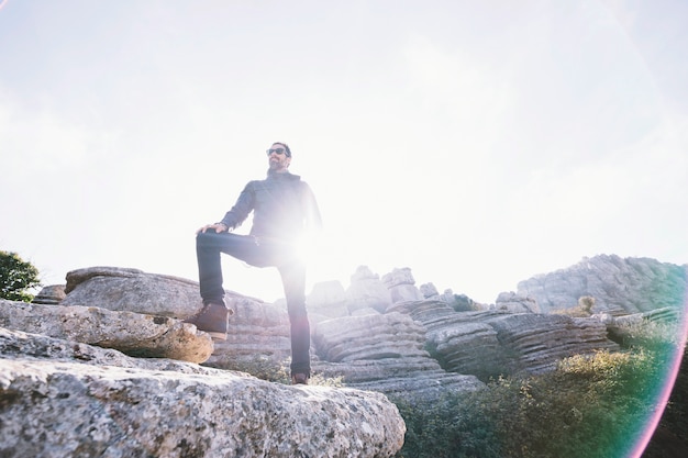 Bearded man on rock