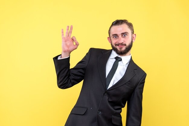 Bearded man showing ok gesture