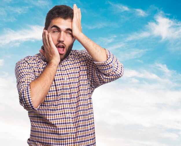 Bearded man on sky background. 