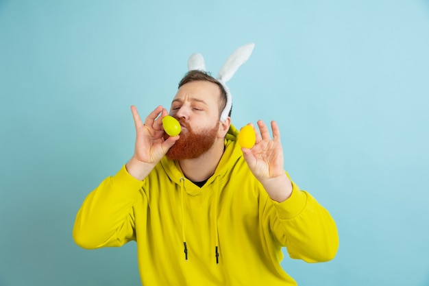 Bearded man with bunny ears for Easter