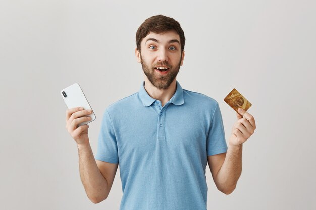 Bearded portrait of a young guy with blue Tshirt