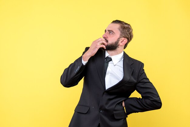 Bearded young man focusing on high resolution