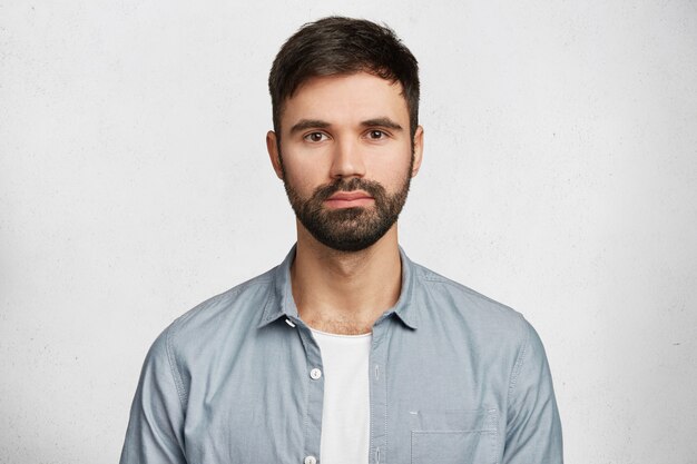 Bearded young man wearing shirt