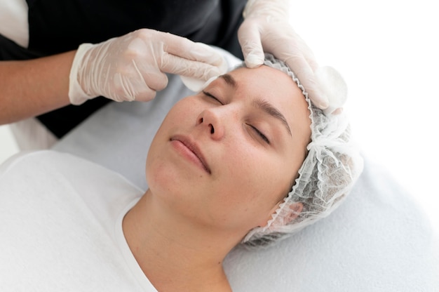 Beautician doing a microblading procedure