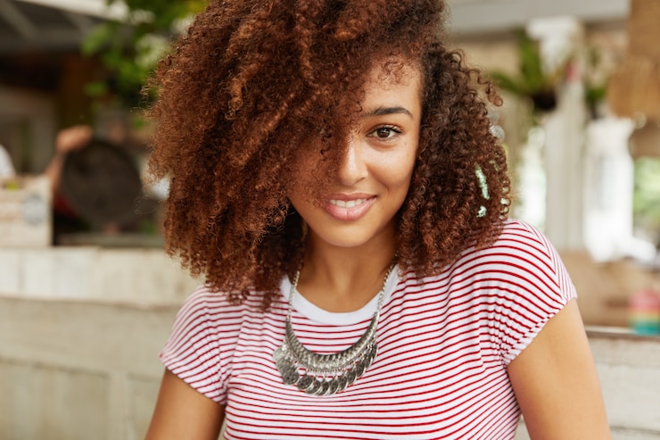 Free Photo beautiful african-american woman in cafe