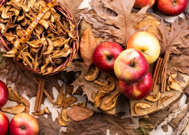 Beautiful apples layout on dry leaves