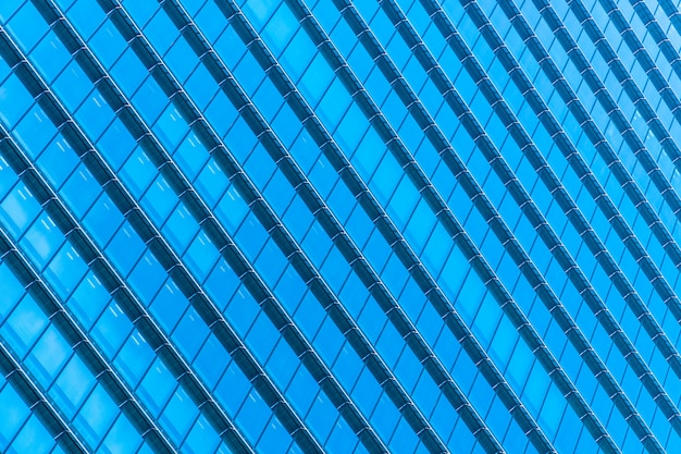 Beautiful architecture office building skyscraper with window glass pattern