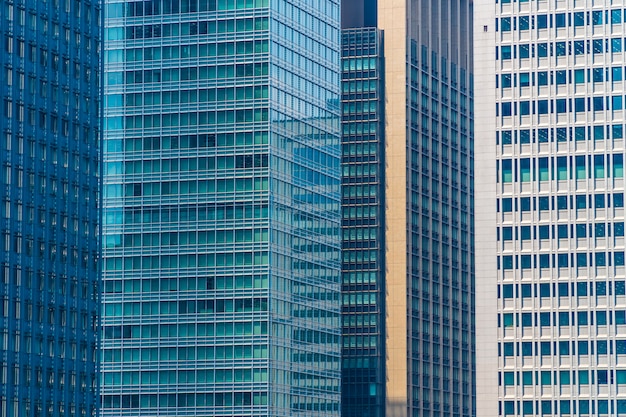 Beautiful architecture office building skyscraper with window glass pattern