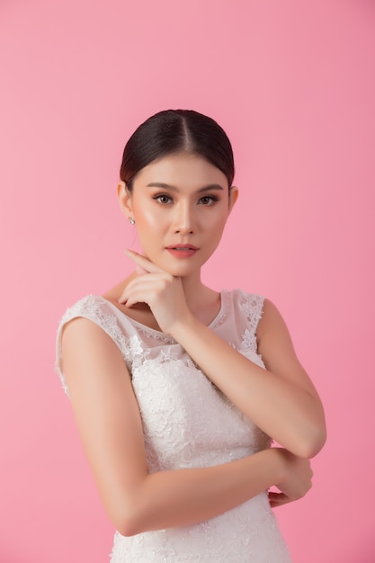 Beautiful asian bride portrait in pink 