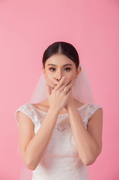 Beautiful asian bride portrait in pink 