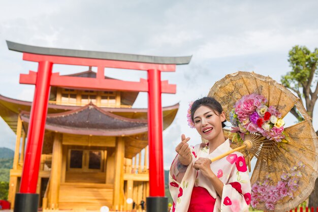 A beautiful Asian woman wearing a Japanese kimono, Traditional dress concept.