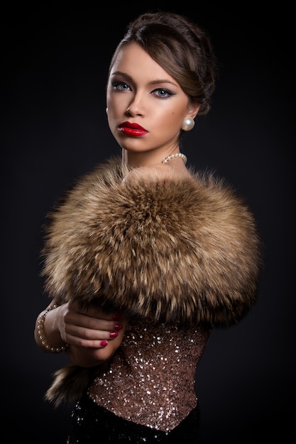 Beautiful, attractive woman wearing fur