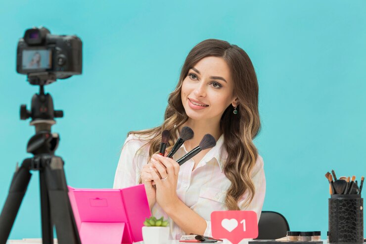 Free Photo beautiful blogger recording make-up video