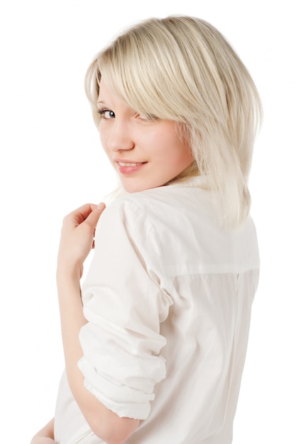 Beautiful blond teenage girl on white
