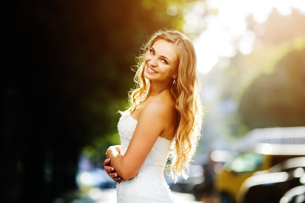 Beautiful blonde bride smiling