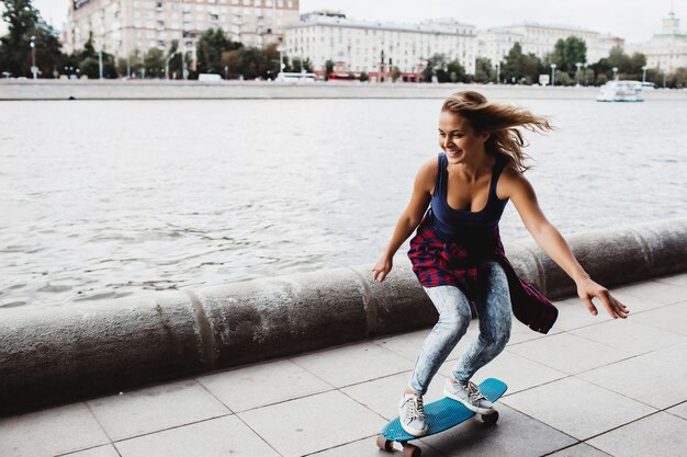 beautiful blonde skateboard on the promenade