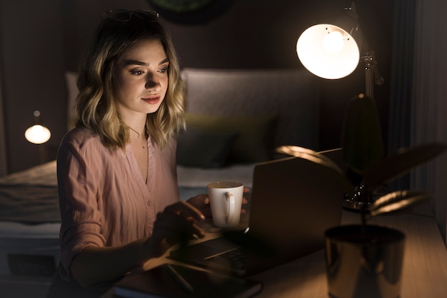 Beautiful blonde woman working at home